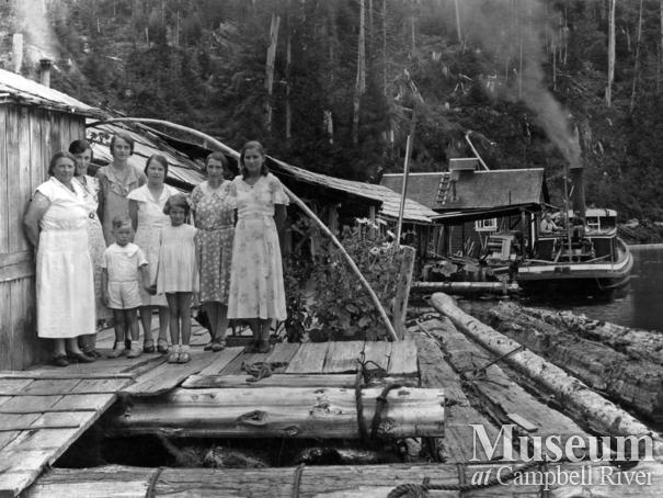 Reynolds family in front of their float house