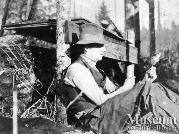 Jim Stanton with a bird at their fishing camp